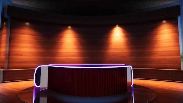 A dimly lit comedy club setting, with a spotlight focused on the microphone stand. The background is blurred, showing tables and chairs, suggesting a live performance venue.