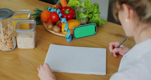 A person tracking their food intake and exercise progress in a wellness journal. The image should convey organization and a proactive approach to health monitoring.