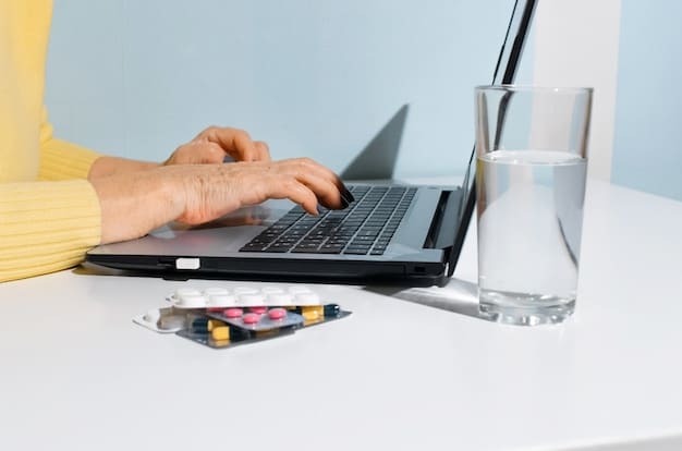 A person filling out a prescription assistance program application form with a laptop displaying a PAP search website in the background.