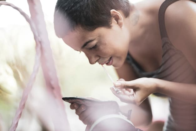 A person using a mindfulness meditation app on their phone, illustrating how technology can aid in practicing mindfulness.