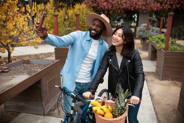 A diverse group of people engaged in sustainable transportation: one riding a bicycle, another using a public bus, and a third charging an electric vehicle at a public charging station, all illuminated by the warm glow of a future-oriented cityscape.