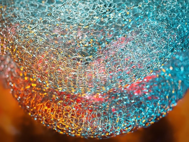 A magnified view of human gut microbiota, depicted as various colorful microorganisms on a gut lining illustration, emphasizing the intricate biological ecosystem.