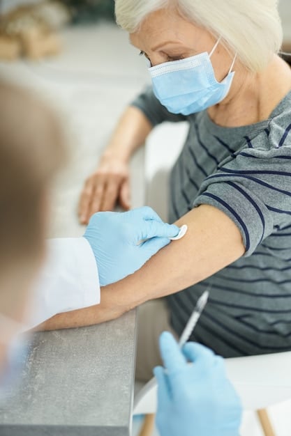 A close-up shot of a healthcare professional administering a vaccine shot to an older adult's arm. The setting is clean and professional, emphasizing safety and care.