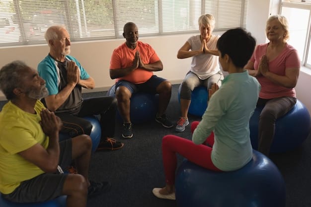A diverse group of people, including older adults, participating in a low-impact group exercise class indoors, emphasizing inclusivity and community support in managing health conditions.