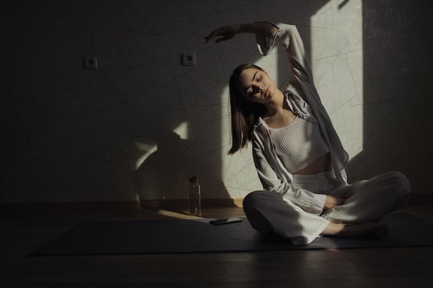 A person performing gentle stretching or light yoga in a dimly lit room, signaling a relaxing wind-down routine before sleep.