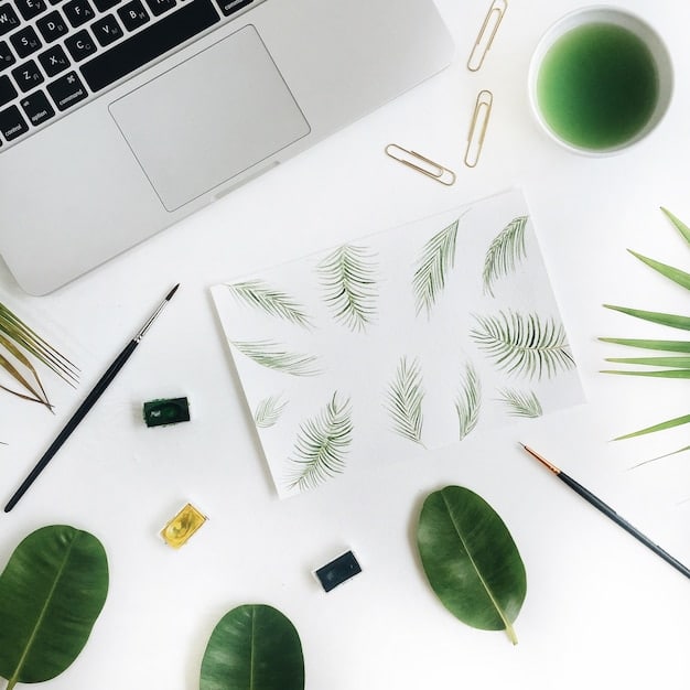 A detailed flat lay of a modern office desk featuring sustainable office supplies. Items include a bamboo notebook, a pen made from recycled plastic, a plant in a biodegradable pot, a reusable coffee cup, and a laptop displaying a vibrant graph often associated with environmental metrics. The background is a clean, minimalist wooden desk.