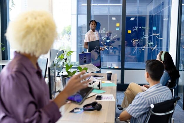 A corporate training room filled with diverse employees actively participating in a workshop about digital transformation and AI integration, displaying engagement and new learning.