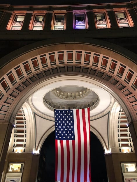 An image of the US Capitol Building with a filter suggesting debate and deliberation, symbolizing the legislative process and potential immigration reform.