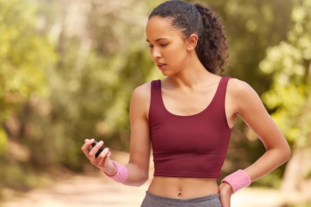 A person using a fitness tracker while jogging in a park. The focus is on the watch displaying heart rate and calories burned, symbolizing the data-driven approach to understanding The Benefits of Exercise: How 30 Minutes a Day Can Transform Your Health.