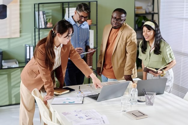 A diverse group of professionals working in a modern office space, collaborating on projects. The image conveys a sense of innovation and adaptation in the workplace, reflecting current labor market trends.